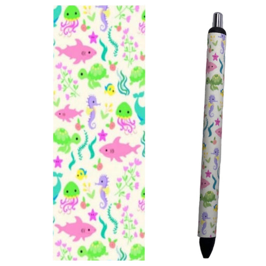 Photo of pen and vinyl design with colorful sea creatures