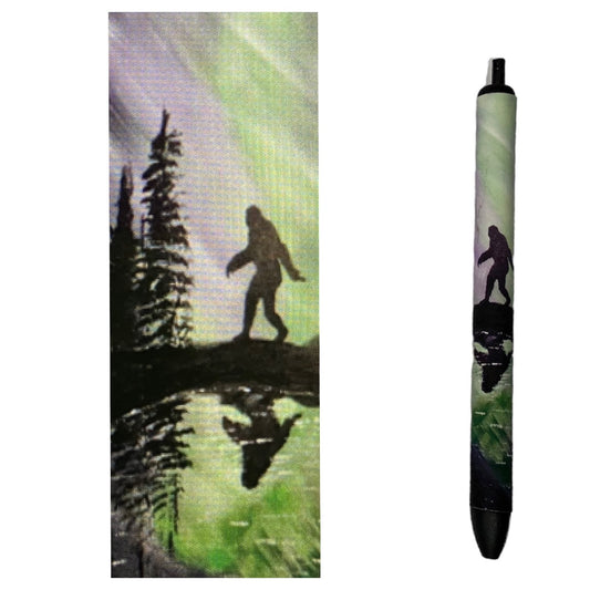 Photo of pen and vinyl wrap design with colored background and figure in background. 