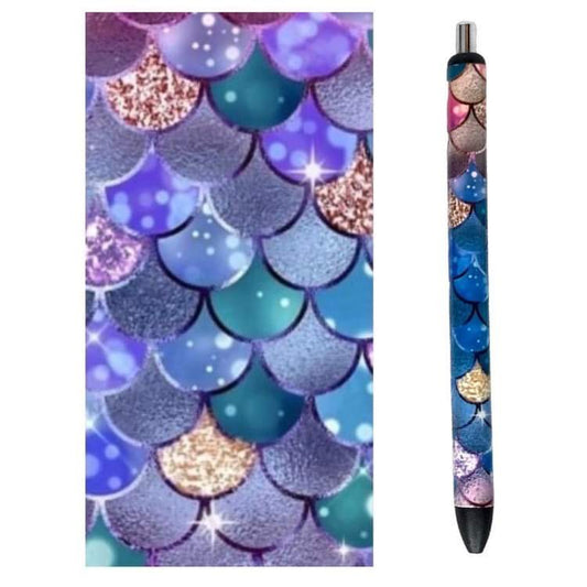 Photo of pen and design wrap with hues of blues and purple in fish scale pattern.