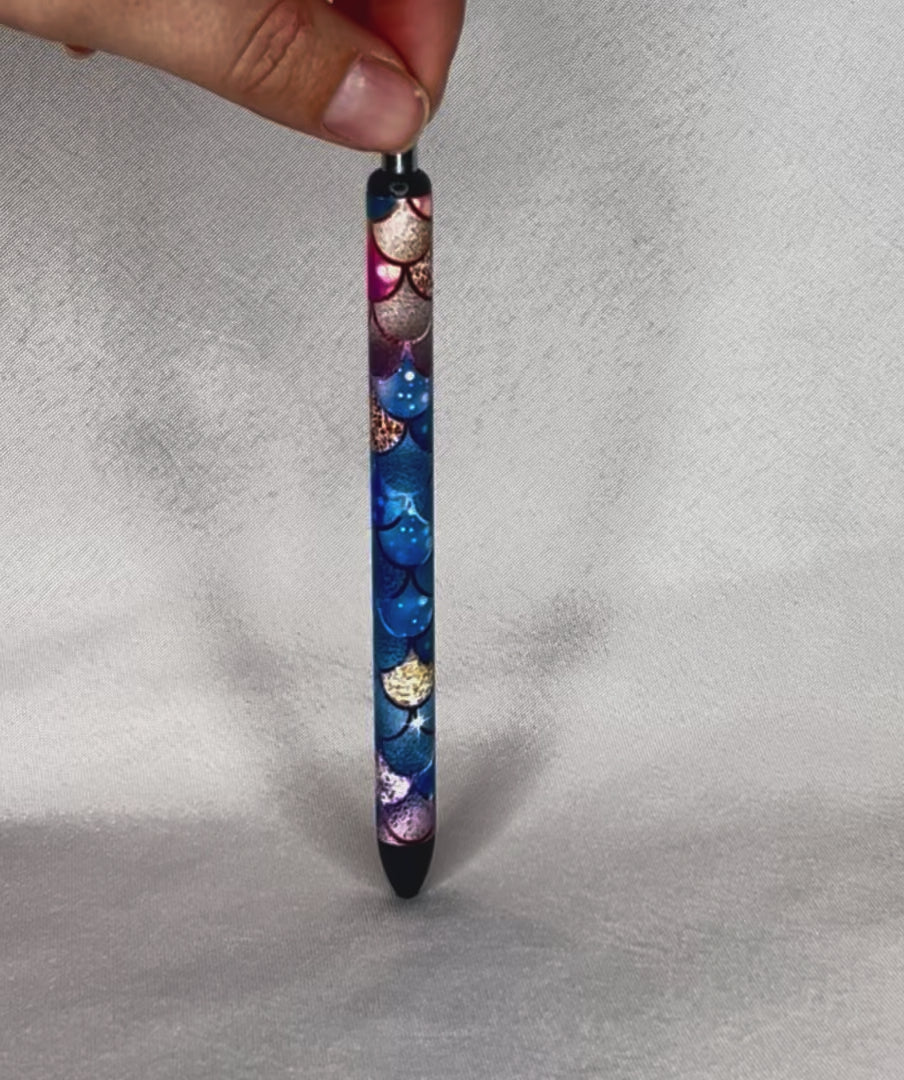 Video of rainbow scale pen spinning to show design. 